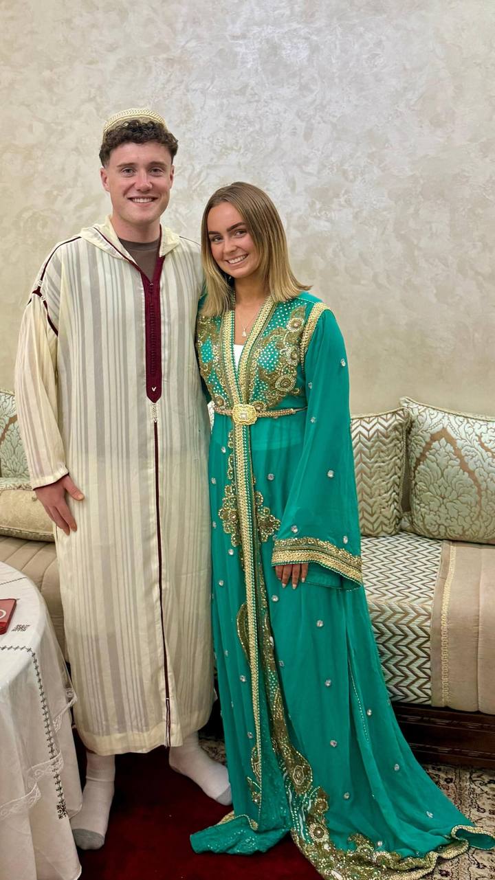 Couple wearing a djellaba and a green caftan